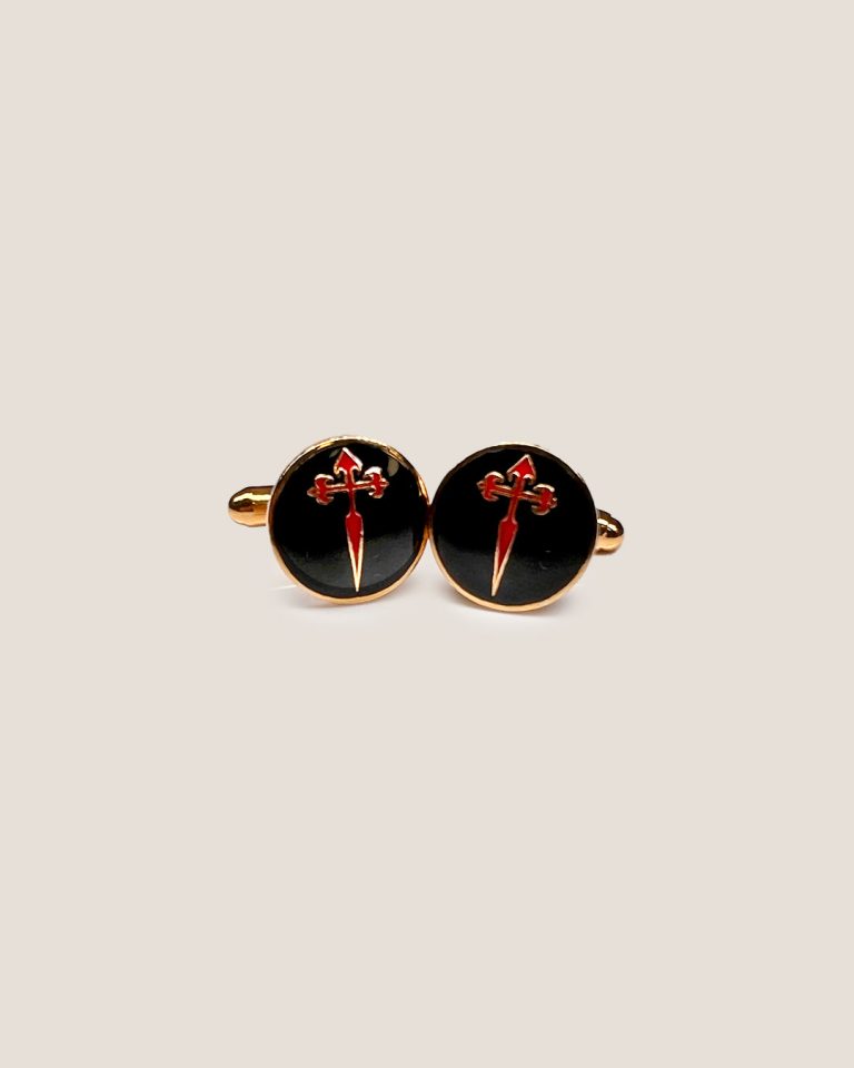 JACOBSLAND black cross cufflinks made of brass with gold plating and enamel, featuring a cross design inspired by the Camino de Santiago. Handmade by artisans with over a hundred years of tradition, perfect for special occasions.