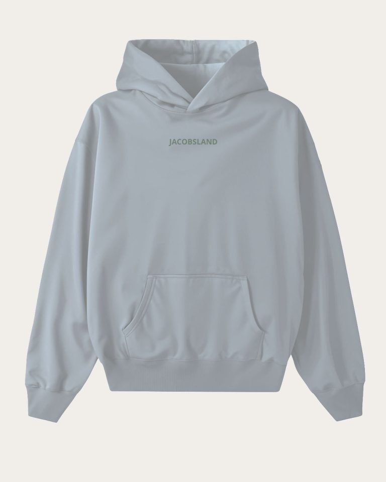 Sudadera con capucha gris de corte oversized con un diseño personalizado inspirado en el Camino de Santiago y la moda contemporánea.